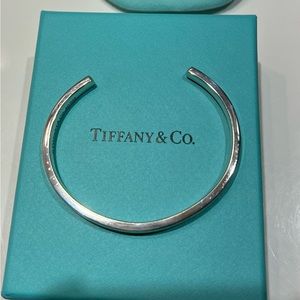 Tiffany Silver Bangle Bracelet T & Co 925 1837 Bangle with cleaning bag and box.